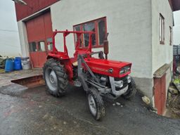 Traktor MF 135 med brøyeskjær